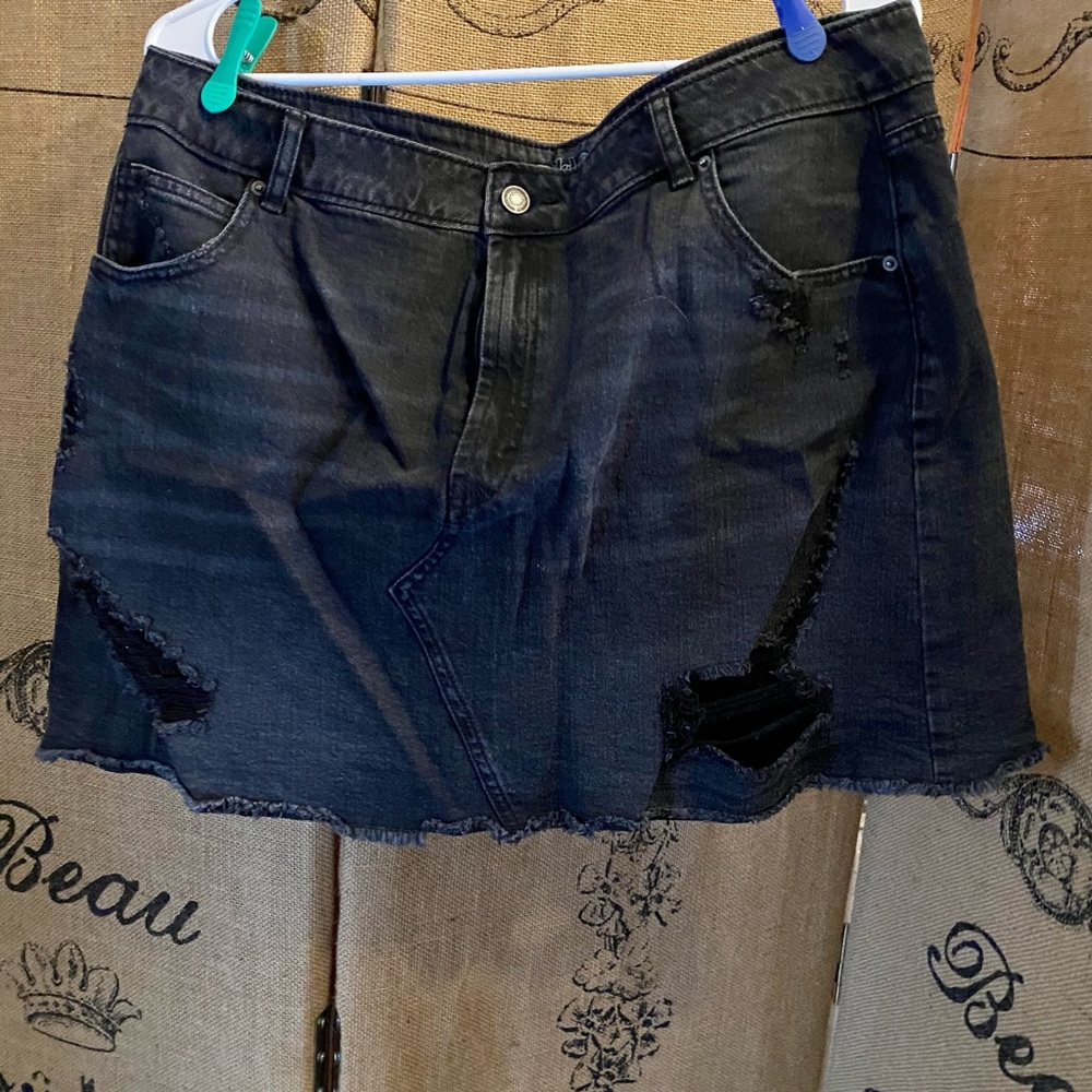 Ripped black denim skirt